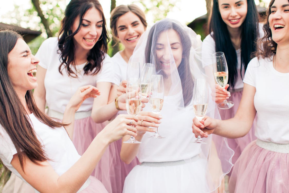 Beautiful Bride and Happy Bridesmaids Celebrating Hen-Party